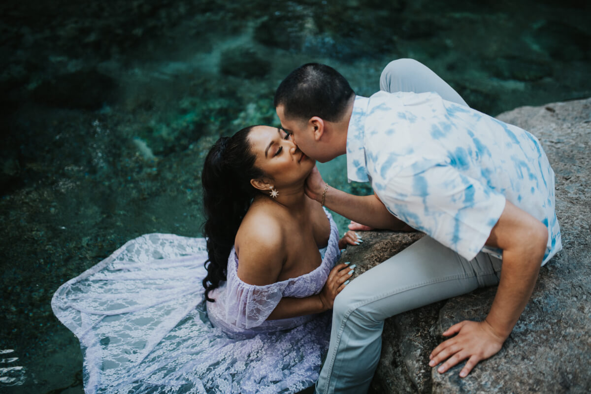 Kissing Couple Expecting Newborn